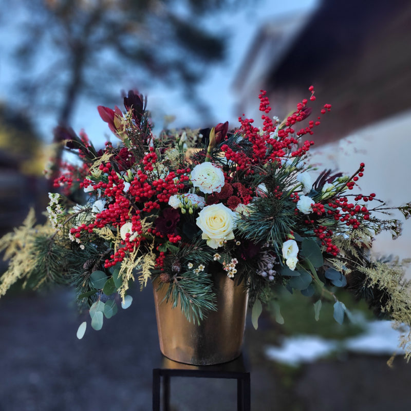 christmas flower arrangements in a vase